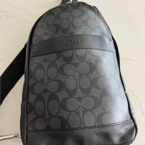 Coach Black Belt Bag with Distinctive Pattern and Textured Fabric